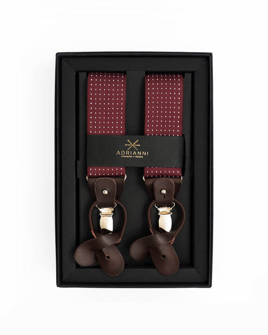 Tirantes fondo granate y topos blancos